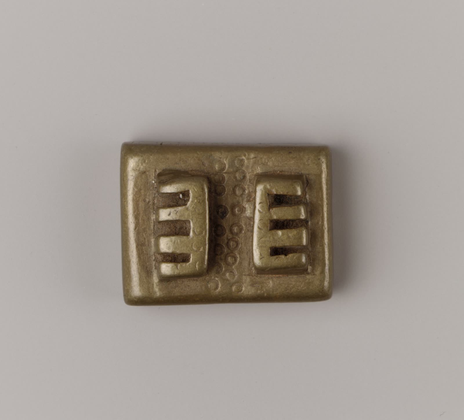 Geometric gold weight